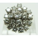 An 18ct white gold ring set with a large cluster of diamonds totalling approximately 2.8ct, with