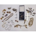A collection of silver jewellery to include rings, necklace, charm bracelet etc