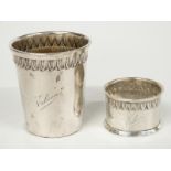 Small German white metal beaker marked 800, height 6cm, and a similarly marked napkin ring, 50g