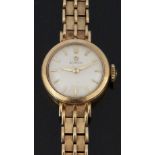 Omega 9ct gold ladies wristwatch ref. 203.069 with gold dauphine hands and baton markers, cream dial