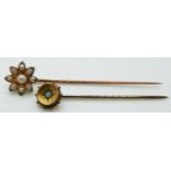 Victorian stick pin set with seed pearls and a Victorian stick pin set with an opal in Longman &