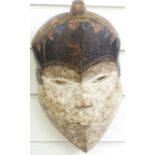 A 19thC / 20thC African tribal mask, height 28cm