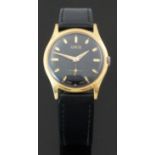 Oris gold plated gentleman's wristwatch with gold hand and markers, black face and signed 7 jewel