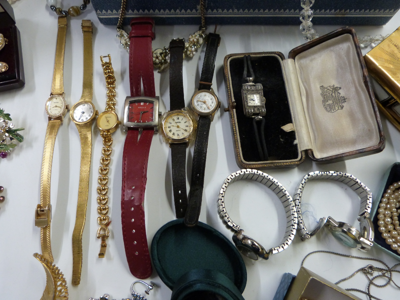 A collection of costume jewellery including large enamel brooches, marcasite, watch, necklaces, - Image 8 of 13