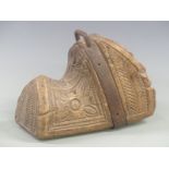An 18th/19thC carved wooden metal bound Spanish or Argentinian stirrup, height 22cm