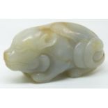 A 19thC carved jade figure of a recumbent pig, height 4cm x length 7.5cm