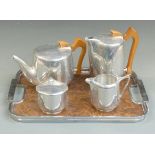 Five piece Picquot Ware tea/coffee set comprising teapot, coffee pot, sugar bowl, milk jug and tray