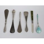 Four various hallmarked silver handled shoe horns, hallmarked silver, mother of pearl and agate page