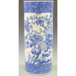 A 19th/20thC Chinese blue and white porcelain stick/umbrella stand decorated with three peonies,