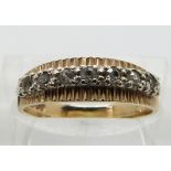 A 9ct gold half eternity ring