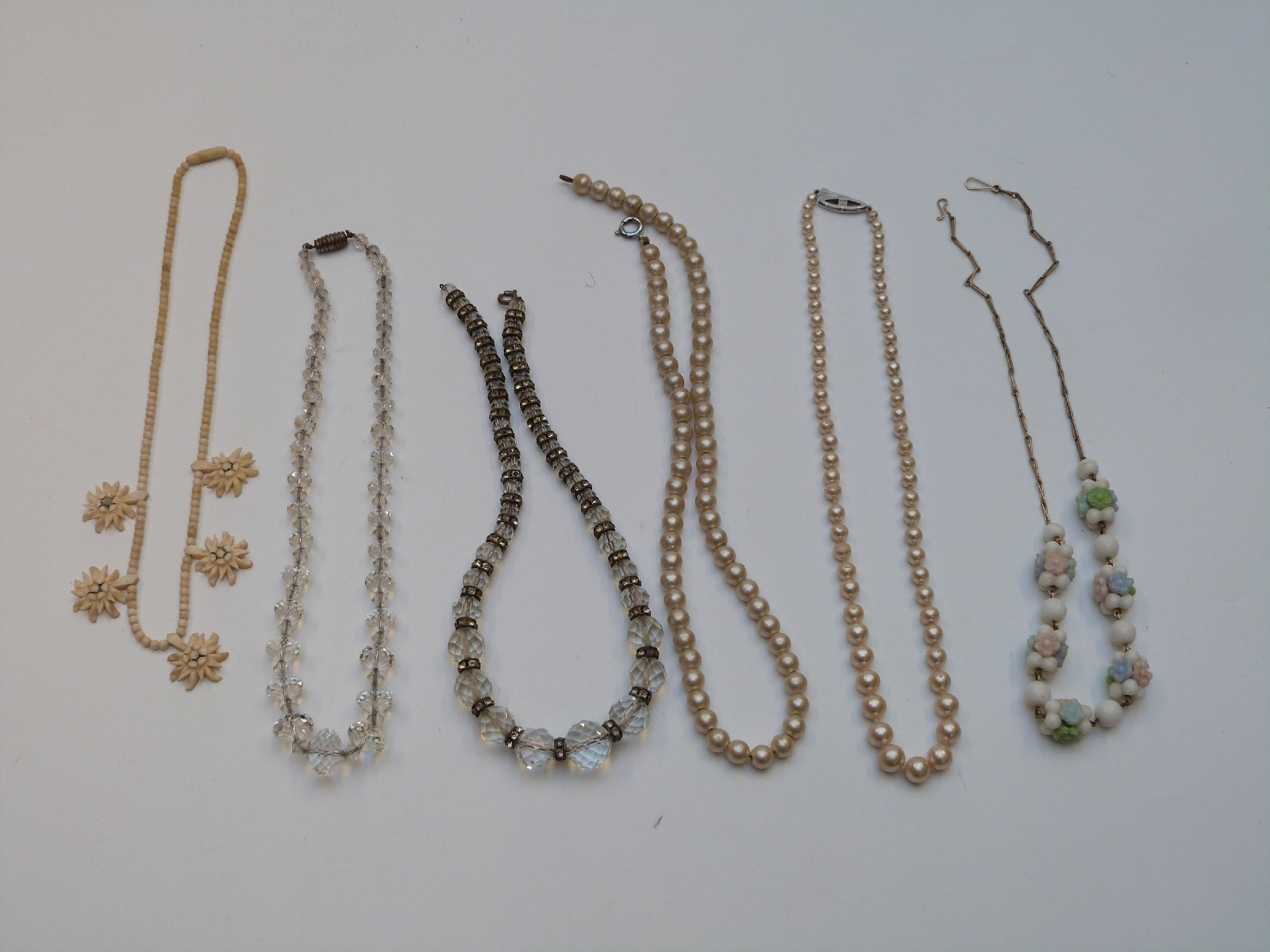 A collection of costume jewellery including glass necklace, Victorian brooch set with plaited - Image 5 of 7