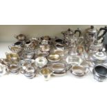 A quantity of silver plated ware including toast racks, wine coaster, bowls, sauce boats, teaware