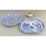 A 19th century Chinese porcelain charger, large willow pattern plate and a Chinese teapot, largest