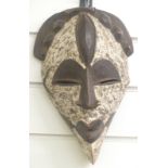 A 19thC / 20thC African tribal mask, height 30cm