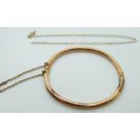 A 15ct gold bangle (6.8g) and a 9ct gold necklace (0.4g)
