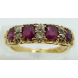 Edwardian 18ct gold ring set with old cut diamonds and oval cut rubies, size K
