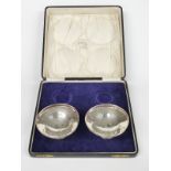 A pair of Edward VII hallmarked silver pedestal bonbon dishes with pierced gallery rims,