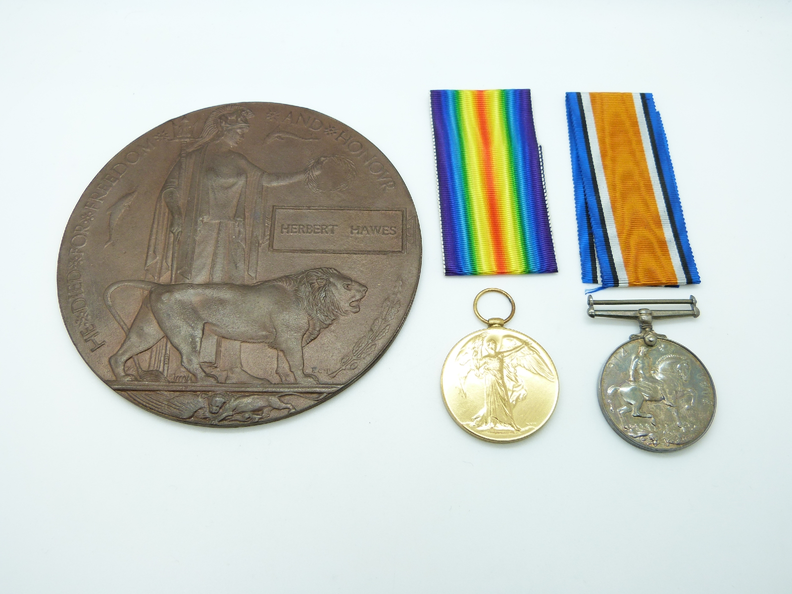 British Army WWI medal pair comprising War Medal and Victory Medal named to Lieut.H. Hawes East