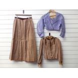 Victorian dress and jacket in brown check with lace cuffs and a blue bodice top