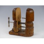 A vintage wooden hat stretcher