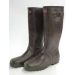 A pair of brown Hunter Wellington boots with neoprene lining, size 9.