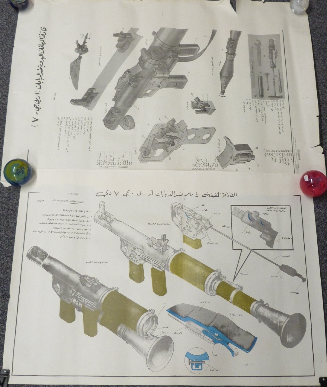 Two Rocket Propelled Grenade (RPG) diagrams or explanatory posters with Eastern script, largest 70 x