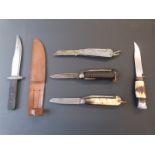 Three clasp knives together with two sheathed hunting knives. Longest blade 16cm.