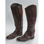 A pair of brown leather hunting/ riding boots, size 10.