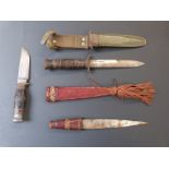 A US Marines knife in sheath, sheath knife and Eastern dagger. Longest blade 16.5cm.