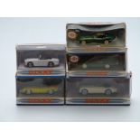 Five Matchbox The Dinky Collection diecast model sports cars including 1960 Jaguar XK150 Drop-Head