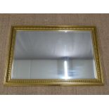Bevelled glass mirror, overall size 66 x 95cm