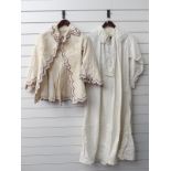 A nightgown with lace trim and an open jacket with embroidered edging