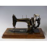 Hengstenberg & Co. Germany sewing machine with mother of pearl inlay, circa 1898, retailed by A.W.