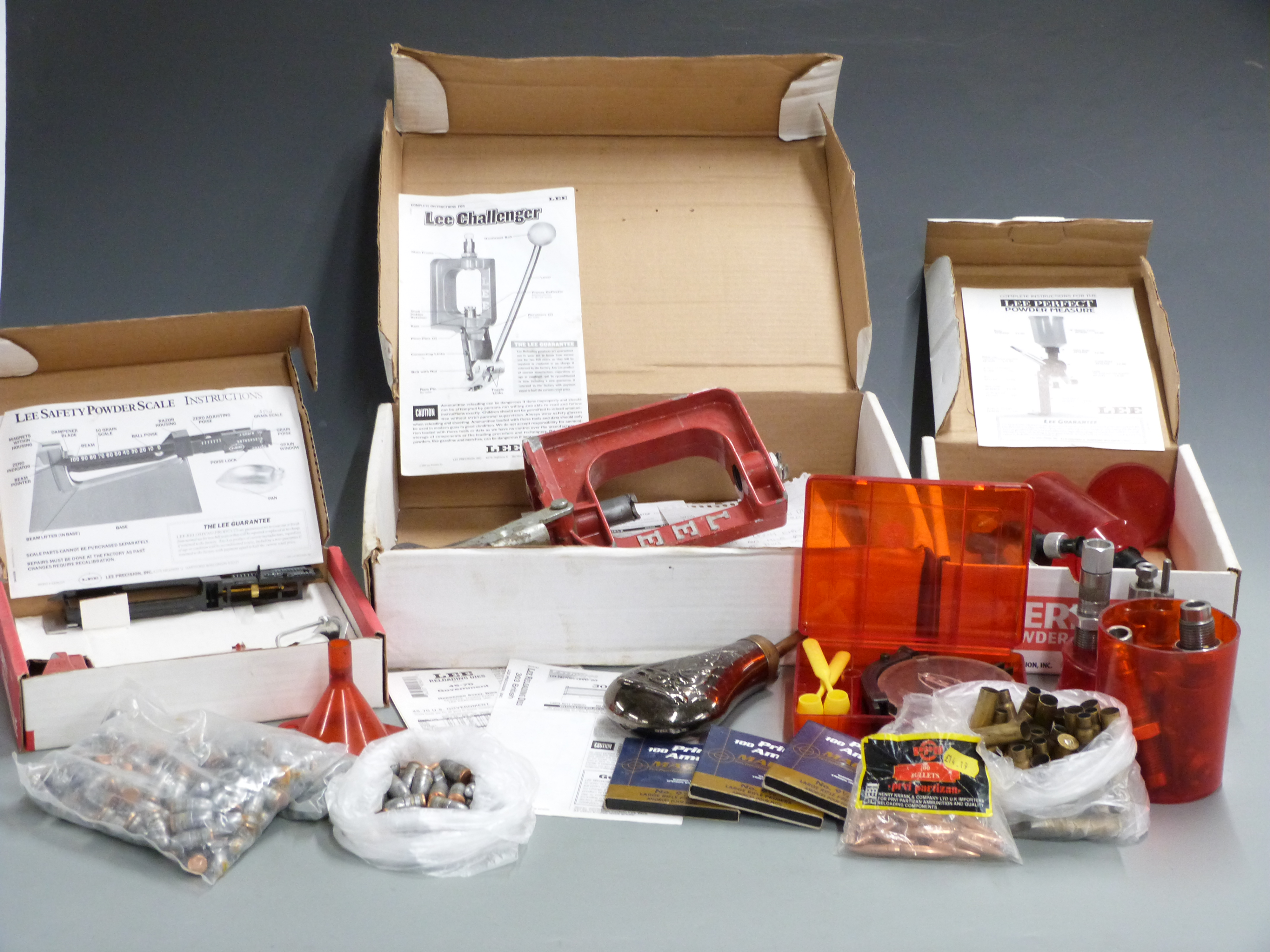 A collection of Lee .303 and .45-70 reloading equipment including Challenger Press Kit, Safety