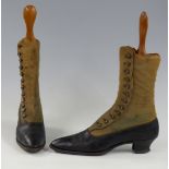 A pair of Victorian ladies buttoned boots with trees