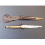 A Fairburn/Sykes style fighting knife with brass handle, blade length 16cm with leather sheaf