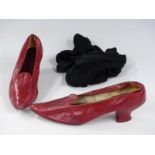 A pair of Victorian red leather shoes with black stockings