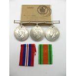 British Army WWII medals comprising War Medal and two Defence Medals in O.H.M.S box addressed to Mr.