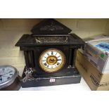 An Ansonia slate and marble architectural mantel clock, 40cm high.