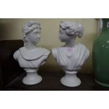 A pair of classical style pottery busts, 31cm high.