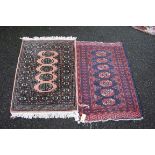 A modern prayer mat, having seven medallions; together with one other prayer mat, largest,