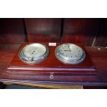 A 1930s combined timepiece and aneroid barometer set,