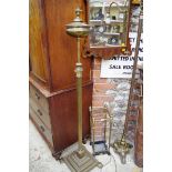 An old brass adjustable Corinthian column standard lamp, converted for electricity.