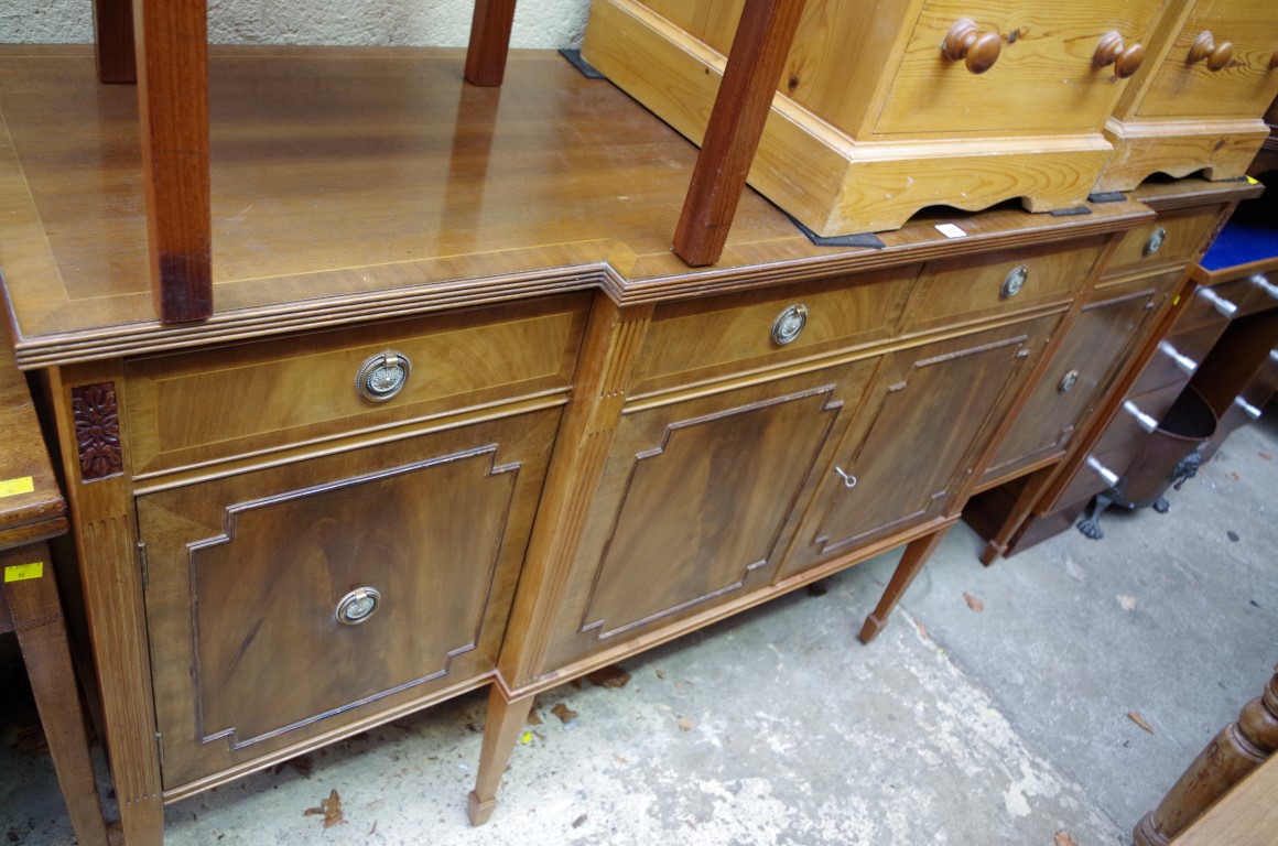 A reproduction mahogany breakfront sideboard, 176cm wide.