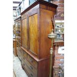 An early 19th century mahogany linen press, 124cm wide.