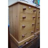 A pair of pine bedside chests, 49cm wide.