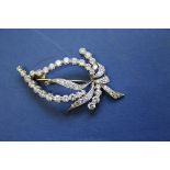 An unmarked platinum and gold diamond leaf brooch, approx 2ct total.