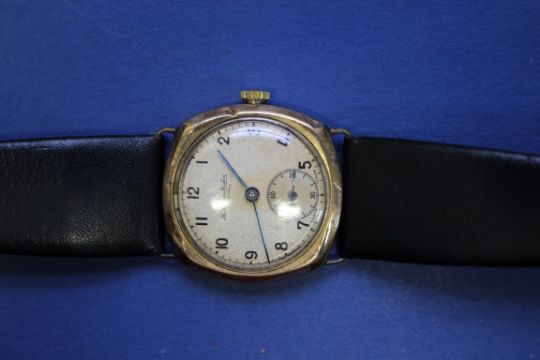 A 1940s Thomas Russell & Son 9ct gold gentleman's wristwatch, on ...