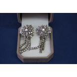 A pair of 18ct white gold diamond cluster and tassel earrings, approx 7.