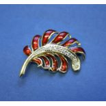 A House of Faberge 14k gold and enamel stylised fern brooch decorated diamonds.
